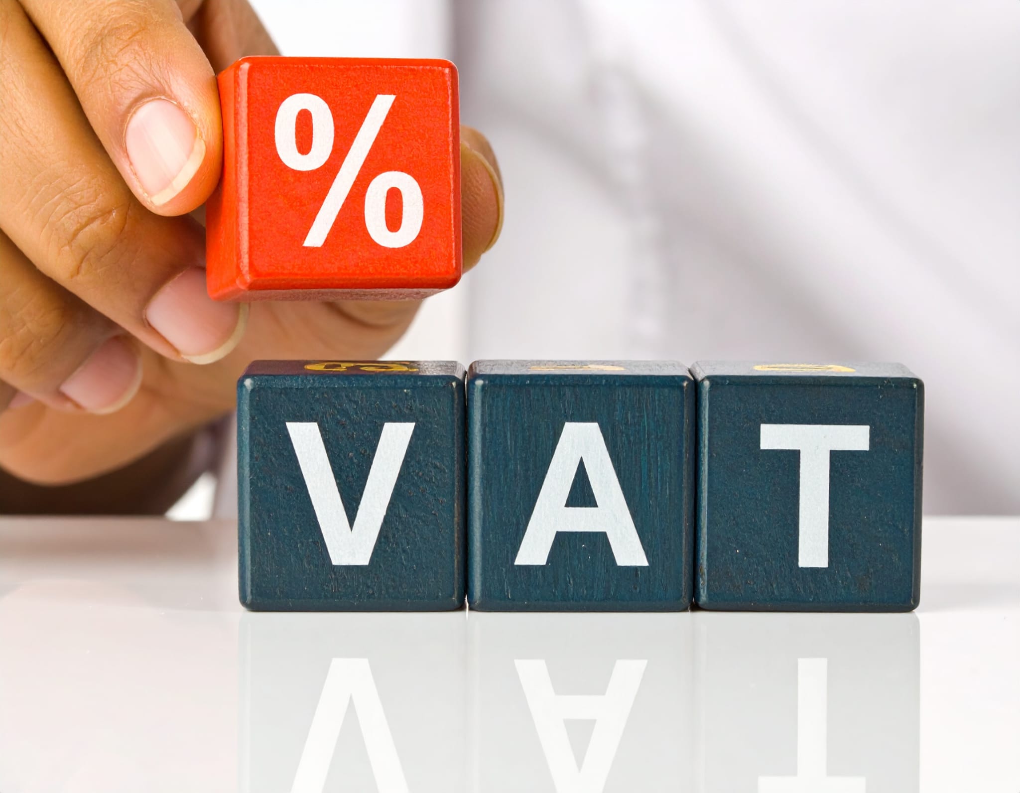 VAT Services. A percentage symbol.